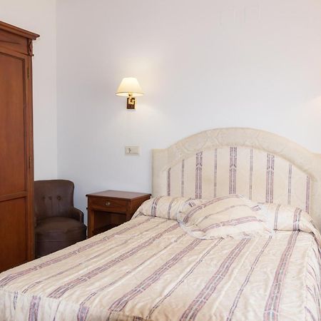ויידנגוס דל פארמו Hotel Avenida III חדר תמונה